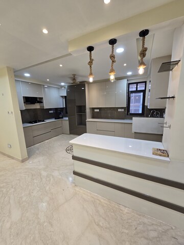 Kitchen in 4 BHK Apartment at DLF Atria, Dlf Phase ii – for Sale