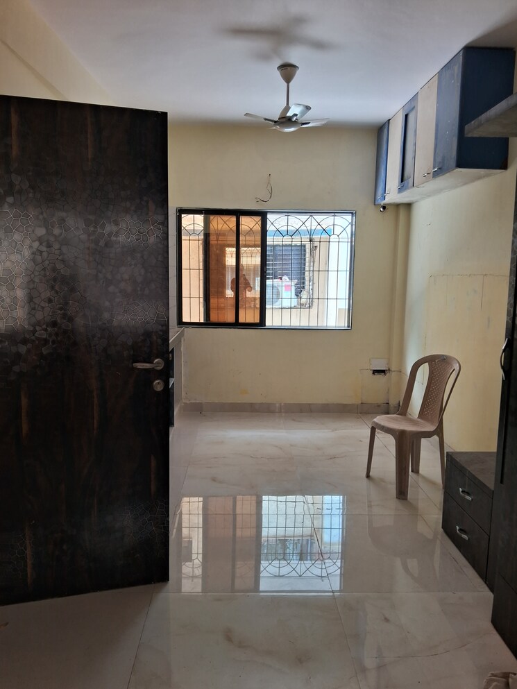 Living Room, zamuna-chs 1 RK 300 Sq.Ft. Apartment In Kopar Khairane Navi Mumbai 8807994