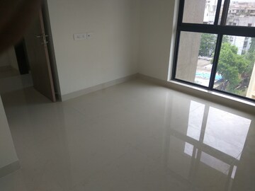 Bedroom in 2 BHK Apartment at Rustomjee Meridian, Kandivali West – for Sale