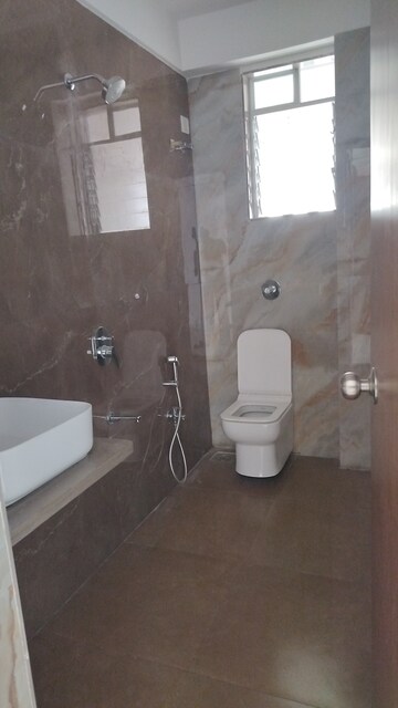 Bathroom in 3 BHK Apartment at Dura Giriraj Sparsh, Naupada – for Sale