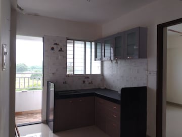 Kitchen in 1 BHK Apartment at Rohan Saroha, Bhugaon – for Rent