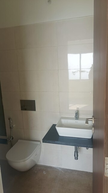 Bathroom in 1 BHK Apartment at Omkar Signet, Malad East – for Rent