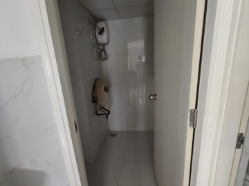 Bathroom in 1 BHK Apartment at Runwal Gardens, Dombivli East – for Rent