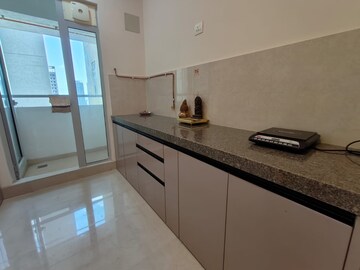 Kitchen in 2 BHK Apartment at Piramal Vaikunth, Balkum Pada – for Rent