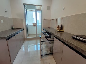 Kitchen in 2 BHK Apartment at Piramal Vaikunth, Balkum Pada – for Rent