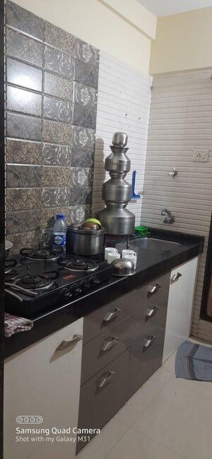 Kitchen in 1 BHK Apartment at Mahavir Kanti Avenue, Nalasopara East – for Sale