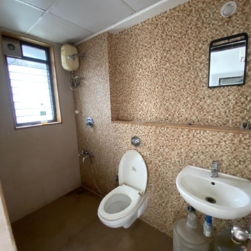 Bathroom in 2 BHK Apartment at Lodha Palava City, Katai Village – for Rent