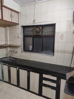 Kitchen in 1 BHK Apartment at Malad Gokul CHS, Malad West – for Sale