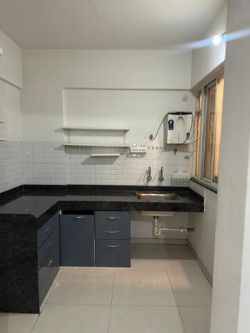 Kitchen in 2 BHK Apartment at Majestique Manhattan, Wagholi – for Sale