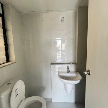 Bathroom in 1.5 BHK Apartment at Runwal Gardens Phase 2, Kalyan Shilphata Road – for Rent