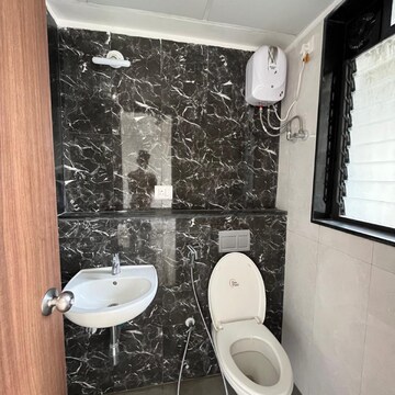 Bathroom in 3 BHK Apartment at Lodha Palava Aurora B and C, Katai Village – for Rent
