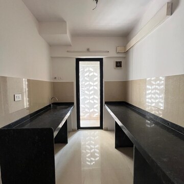 Kitchen in 2 BHK Apartment at Lodha Palava Downtown, Taloja Bypass Road – for Rent