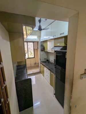 Kitchen in 2 BHK Apartment at Shanti Rishita Apartment, Mira Road – for Sale