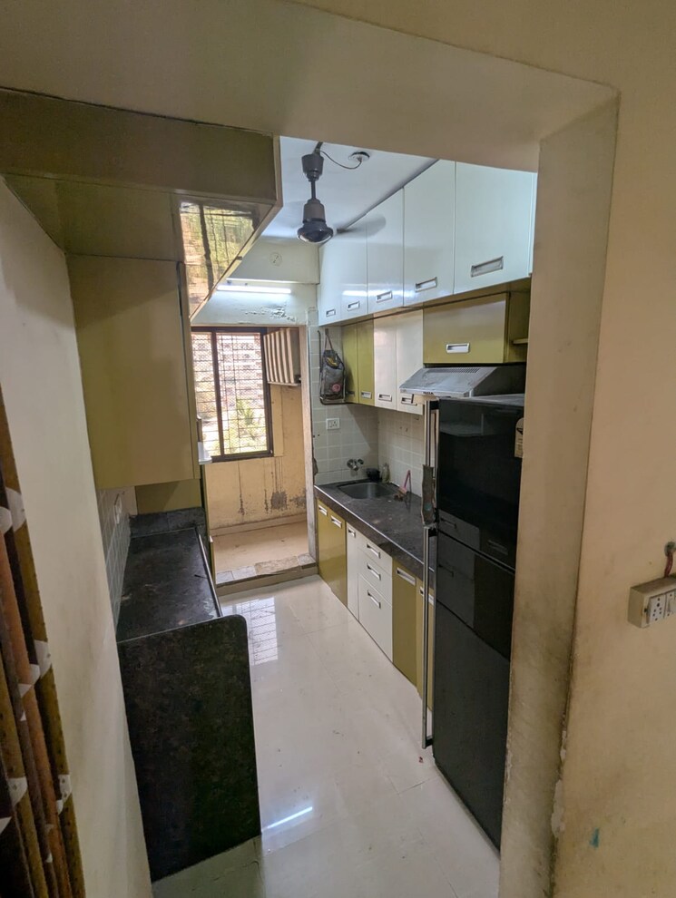 Kitchen, shanti-rishita-apartment 2 Bedroom 520 Sq.Ft. Apartment In Mira Road Thane 8809344