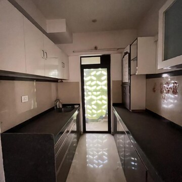 Kitchen in 2 BHK Apartment at Lodha Palava Downtown, Taloja Bypass Road – for Sale