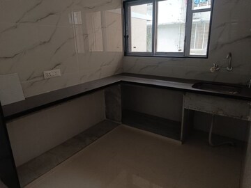 Kitchen in 2 BHK Apartment at Yash Ina Apartments, Goregaon West – for Rent