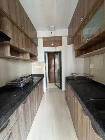 Kitchen in 3 BHK Apartment at Lodha Palava Downtown, Dombivli East – for Rent
