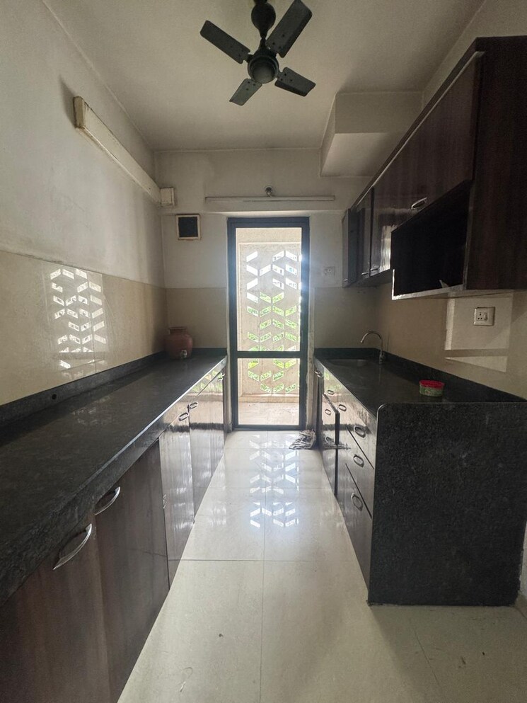 Kitchen, lodha-palava-city-lakeshore-greens 3 Bedroom 817 Sq.Ft. Apartment In Dombivli East Thane 8809386