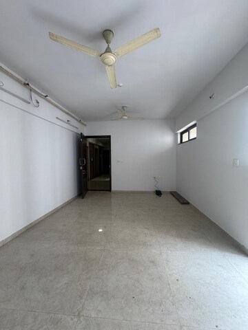 Living Room in 1 BHK Apartment at Lodha Palava City Lakeshore Greens, Dombivli East – for Sale