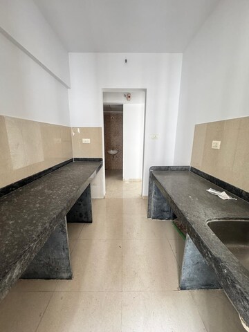 Kitchen in 1 BHK Apartment at Lodha Palava City Lakeshore Greens, Dombivli East – for Sale