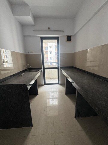Kitchen in 1 BHK Apartment at Lodha Palava City Lakeshore Greens, Dombivli East – for Sale