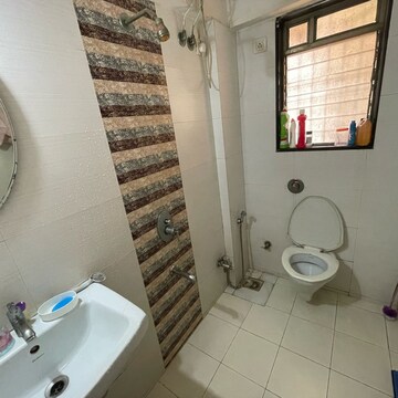 Bathroom in 2 BHK Apartment at Sankalp II, Riddhi Gardens – for Rent