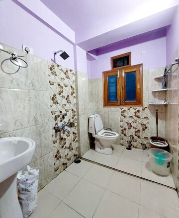 Bathroom in 4 BHK Apartment at Panthaghati – for Sale