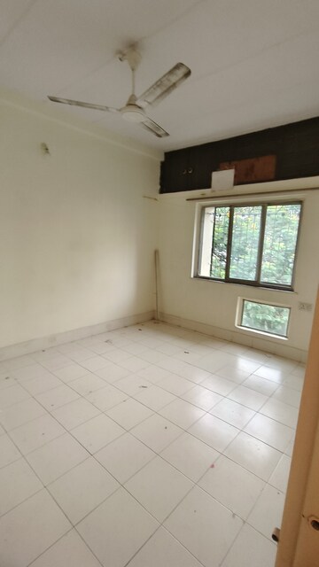 Bedroom in 2 BHK Apartment at Herumb CHS, Kurla East – for Rent
