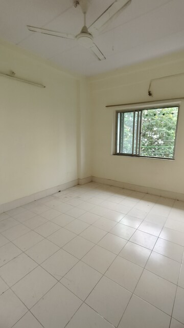 Master Bedroom in 2 BHK Apartment at Herumb CHS, Kurla East – for Rent