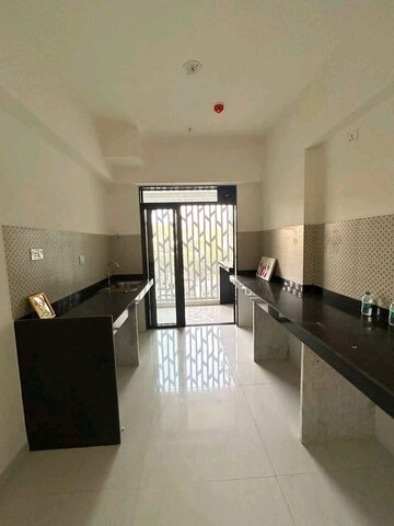 Living Room in 2 BHK Apartment at Lodha Woods, Kandivali East – for Sale