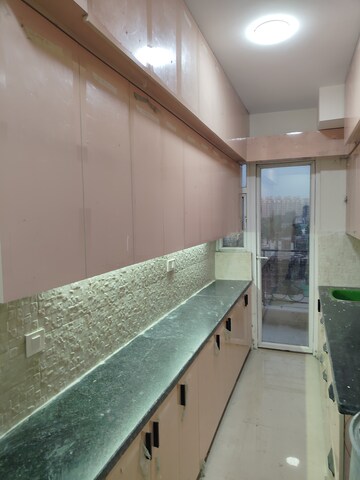 Kitchen in 2 BHK Apartment at Signature The Millennia 2, Sector 37d – for Rent