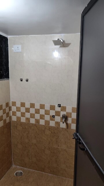 Bathroom in 2 BHK Apartment at Shruti CHS Kopar, Kopar Khairane – for Rent