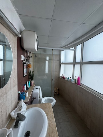Bathroom in 3 BHK Apartment at Mahagun Moderne, Sector 78 – for Rent