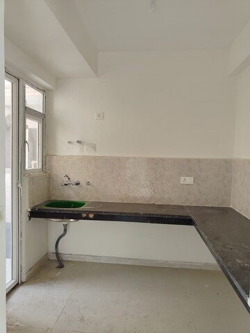 Kitchen in 2 BHK Apartment at Signature The Millennia 2, Sector 37d – for Rent