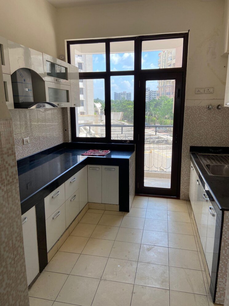 Kitchen, uppal-plumeria-garden-estate 3 Bedroom 1737 Sq.Ft. Apartment In Omicron Iii Greater Noida Greater Noida 8810145