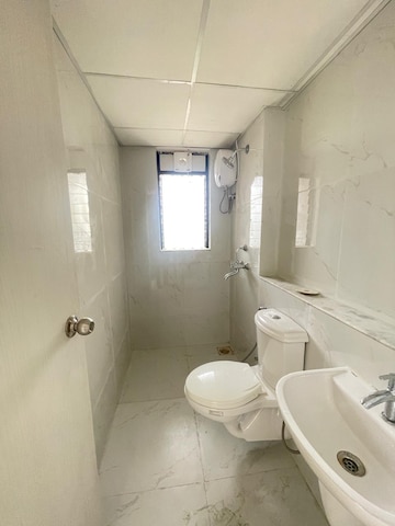 Bathroom in 1 BHK Apartment at Runwal Gardens Phase I, Dombivli East – for Sale