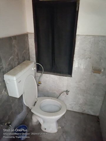 Bathroom in 1.5 BHK Apartment at Techman Moti Residency, Raj Nagar Extension – for Sale