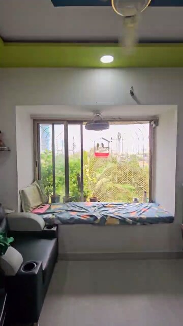 Bedroom in 1 BHK Apartment at Lokhandwala Riviera Tower, Kandivali East – for Rent