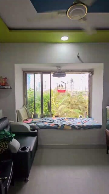Bedroom in 1 BHK Apartment at Lokhandwala Riviera Tower, Kandivali East – for Rent
