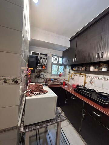 Kitchen in 3 BHK Apartment at Madhav Kunj The Sarawasti Vihar CGHS, Rohini Sector 9 – for Sale