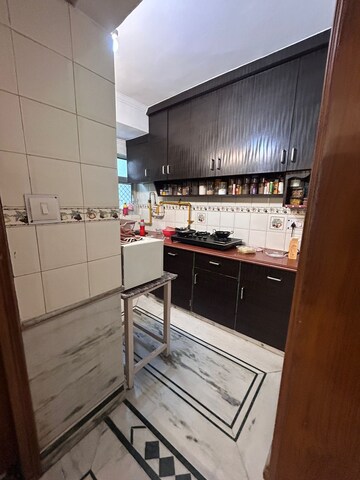 Kitchen in 3 BHK Apartment at Madhav Kunj The Sarawasti Vihar CGHS, Rohini Sector 9 – for Sale