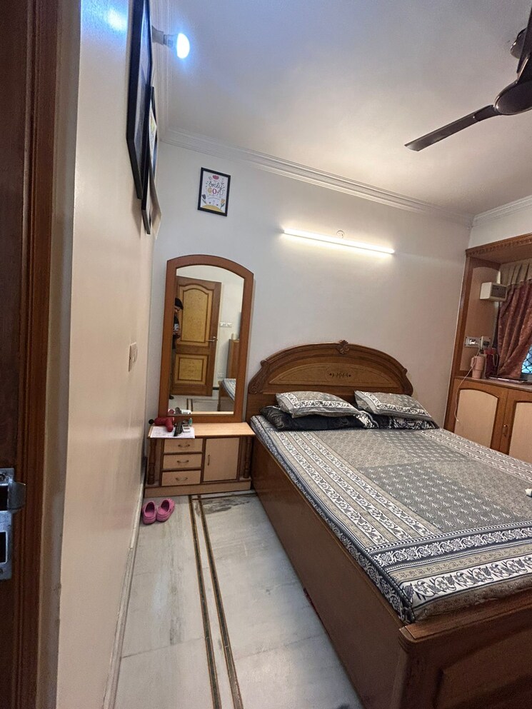 Bedroom, madhav-kunj-the-sarawasti-vihar-cghs 3 Bedroom 1250 Sq.Ft. Apartment In Rohini Sector 9 Delhi 8810334