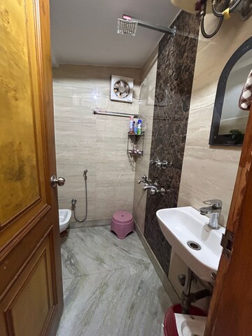 Bathroom in 3 BHK Apartment at Madhav Kunj The Sarawasti Vihar CGHS, Rohini Sector 9 – for Sale