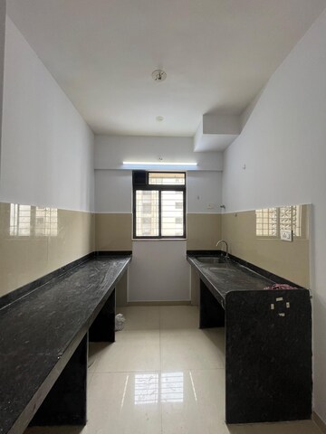 Kitchen in 1 BHK Apartment at Lodha Palava Downtown, Dombivli East – for Rent