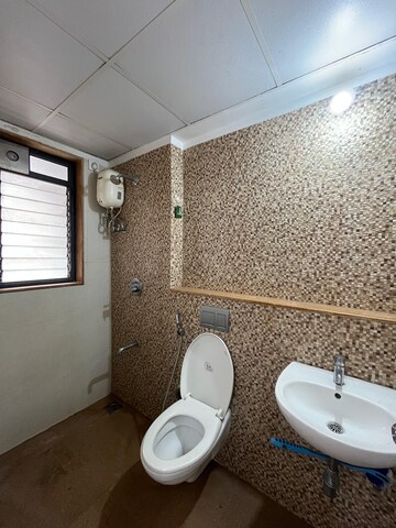 Bathroom in 1 BHK Apartment at Lodha Palava Downtown, Dombivli East – for Rent