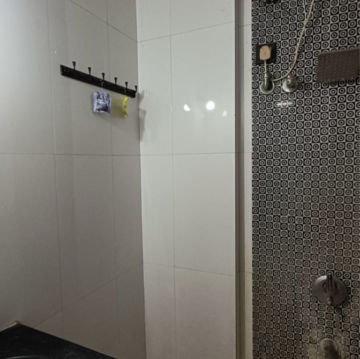 Bathroom in 2 BHK Apartment at Dedhia Platinum, Waghbil – for Rent