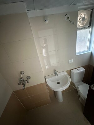 Bathroom in 2 BHK Apartment at Nilaya Greens, Raj Nagar Extension – for Sale