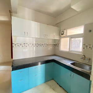 Kitchen in 2 BHK Apartment at Signature Global Orchard Avenue, Sector 93 – for Sale