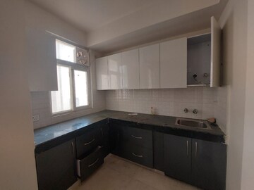 Kitchen in 2 BHK Apartment at Pivotal Riddhi Siddhi, Sector 99 – for Rent