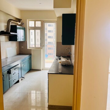 Kitchen in 3 BHK Apartment at Corona Optus, Basai Enclave 2 – for Rent